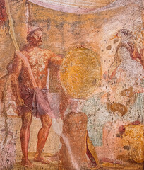 Pompeii, Italy. Ancient Frescoes In Wall Of Old Building