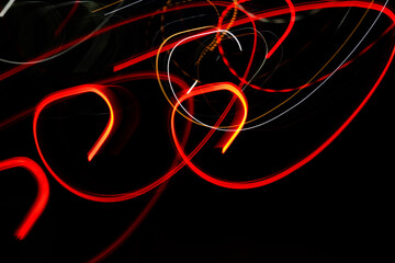 A black and red image with a lot of red lines