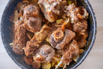 Meat vegetables tray  cooked in oven on wooden background  with mock up space