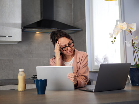 Businesswoman working at home - stress - period