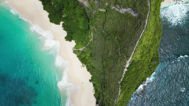 Nusa Penida Kelingking Beach Moving Backward from top drone view eagle eyes