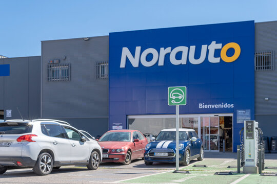 Facade of a mechanic workshop of the international company of mechanics and repair of vehicles, Norauto. Palma de Mallorca, Spain