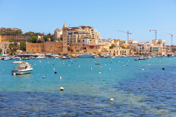 View of Marsaskala town in Malta. Marsaskala Bay with boats