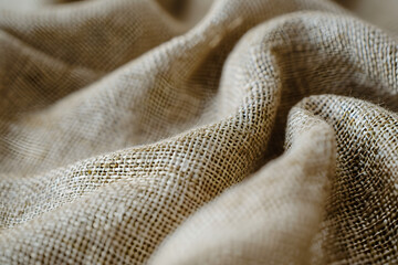 A detailed photo of the texture of a high-end fabric, showing the weave and quality of the material