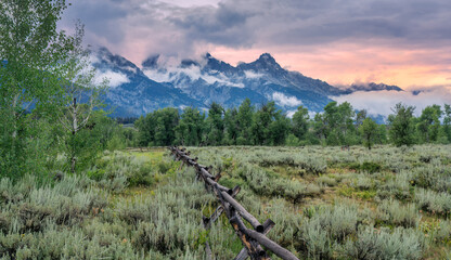 Sunrise lighting at Grand Teton National Park - fence boundary for the Chapel of the Transfiguration