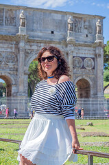 Vacation in Rome - Italy. Concept of tourism and holidays. European or American Woman in city scene