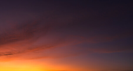 Evening sky backgrounds, dusk sky twilight after sundown with colorful orange sunlight in summer...