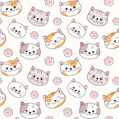 Seamless vector pattern of cartoon cat faces and footprints, children's wallpaper design, textile print, packaging.