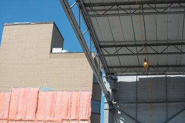 Naklejka premium sidewalk shed or pedestrian protection scaffold