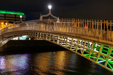 The Ha'penny bridge in Dublin City, Ireland. Night view.