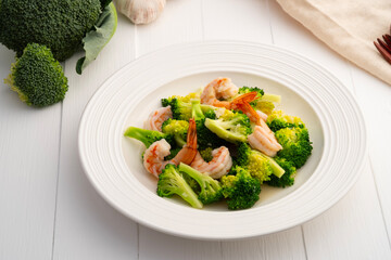 Stir Fried Broccoli with Shrimp in white plate.Healthy menu.