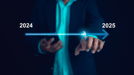 Start new business and new life, Businessman touch on virtual bar status to change from 2024 to 2025, Countdown of merry Christmas and happy new year by technology concept, New year's start-up.