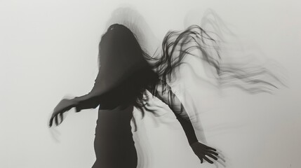 Fototapeta premium blurry silhouette of a woman on white background