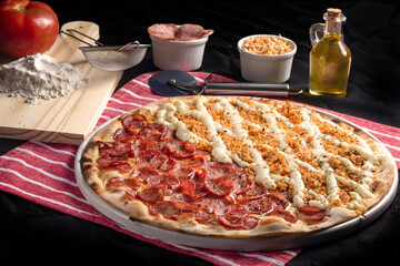 pizza with ham and cheese