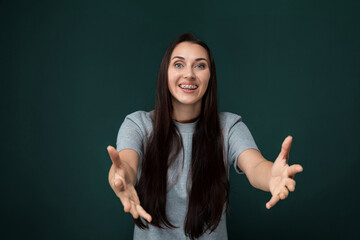 Woman With Long Black Hair Holding Out Her Hands