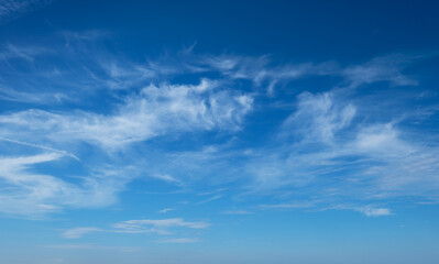 Clear Blue Sky with Wispy Clouds on a Sunny Day - Nature, Weather, and Serenity