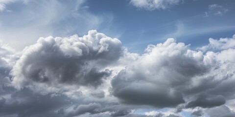 Obraz premium Blue sky with beautiful cumulus clouds, perfect for nature and weather photography.