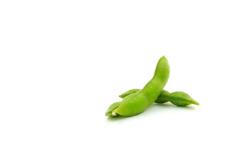 Fresh edamame soybeans and pods isolated on white background.