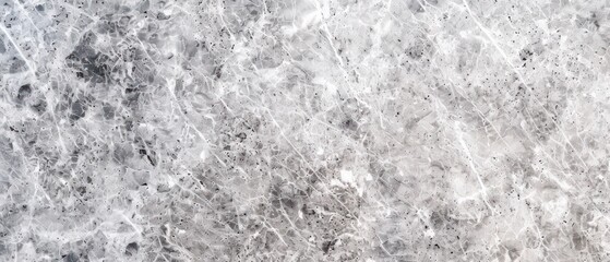 Silver granite interwoven with light grey streaks, offering a sleek and elegant stone finish