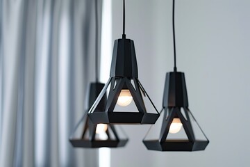 Modern black pendant lights with vintage light bulb in a modern house interior. Hanging ceiling light in a white shared office space. Decorative geometric metal lamp. Suspended chandelier loft style