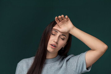 Woman Holding Her Head in Her Hands