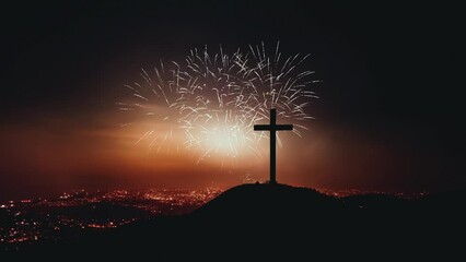 Fireworks festival celebrating the end of the year and New Year, cityscape and church cross silhouette at Christmas and New Year's night

