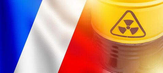 Barrel uranium. France flag. Radiation hazard sign. France uranium industry. Supply hazardous fuel. Import uranium to France. Barrel with chemical substance. Fuel for nuclear power plant concept © Grispb