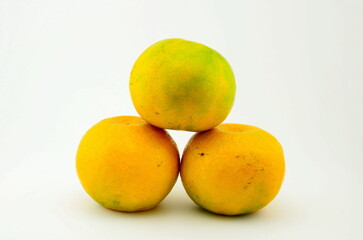 Three fresh ripe oranges with wihte background