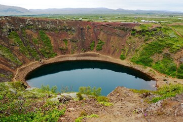 Visitors walking the volcano crater lip in Grimsnes-og Grafningshreppur © drewrawcliffe