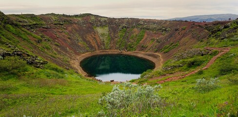 Visitors walking the volcano crater lip in Grimsnes-og Grafningshreppur © drewrawcliffe
