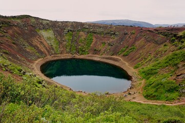 Visitors walking the volcano crater lip in Grimsnes-og Grafningshreppur © drewrawcliffe