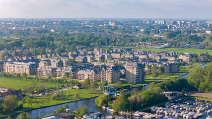 Aerial drone photo of a residential neighbourhood with luxury apartment buildings in Voorschoten, the Netherlands.