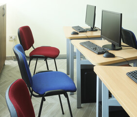 Classic small simple room classroom with computers. Interior IT concept