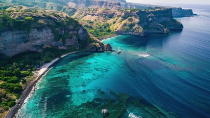 Obraz premium Aerial view of a stunning coastline with turquoise waters and rugged cliffs. Natural beauty. --ar 16:9 --style raw Job ID: 802608a2-66f1-4826-956d-038b9521bc4f