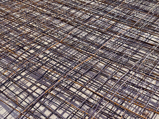 Fototapeta premium Background of metal bars at the construction site