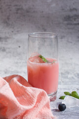 milky strawberry drink with mint and ice and a refreshing drink, freshly squeezed refreshing juice