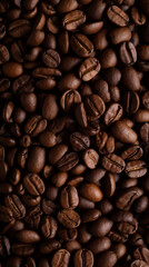 Top-View of Dark-Roasted Brown Coffee Beans Background: Perfect for Coffee Shop Designs and Elegant Business Branding