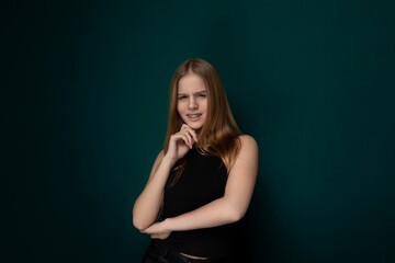 Fototapeta premium Woman in Black Dress Posing for Picture