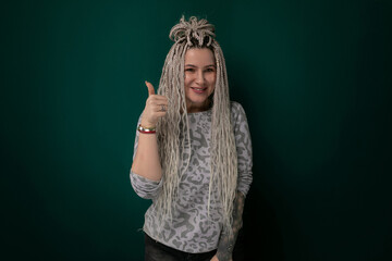 Woman With Long Blonde Dreadlocks Giving a Thumbs Up