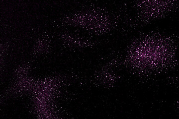 Starry night sky. Galaxy space background. Purple violet pink magenta glowing stars in the night. New Year, Christmas and Celebration background concept.