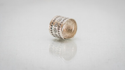 Tribal vintage silver ring on white background