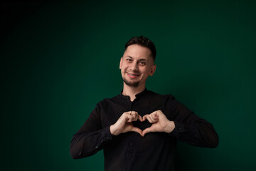 Man Making Heart Shape With Hands