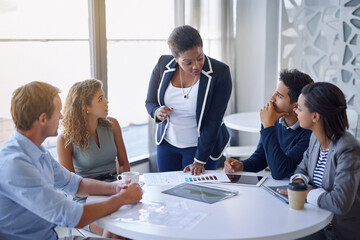 Business meeting, people and accountants with tablet and documents for sales review and financial report. Corporate group, budget plan and discussion in office for accounting research, erp and growth