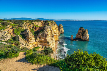 Ponta da Piedade is a unique rock formation with famous grottos in the ocean at Lagos, Algrave, Portugal