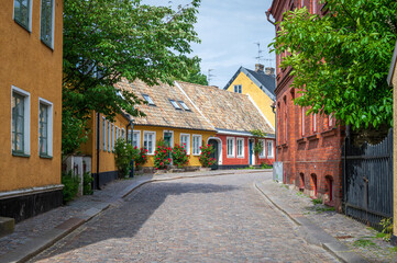 Town houses in medieval street in Lund Sweden on summer day