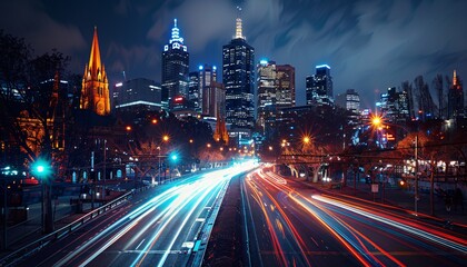 Fototapeta premium Vibrant Night Cityscape with Light Trails and Illuminated Skyscrapers in Urban Downtown Area