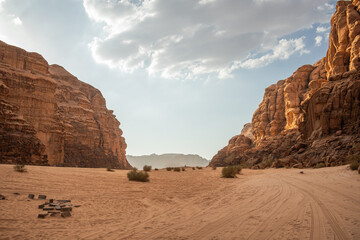 Desert Landscape with Rock Formation during Afternoon in Jordan. Beautiful Outdoor Scenery of Wadi Rum with Sandy Surface.