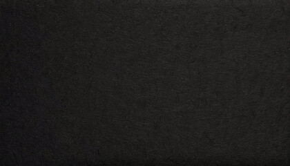 Dark, dusty, grainy, rough, earthy handmade black paper texture with visible fibers, for minimalistic art or backgrounds.