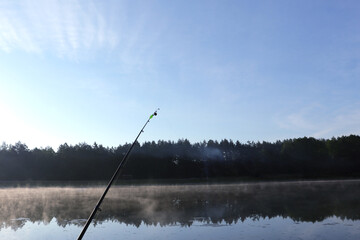 spinning. the bell is twitching. there is a bite. late evening. focus on the bells.