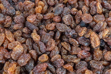 Dried nuts and sultana raisins, a rich source of fiber, close-up view